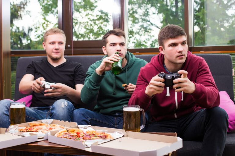 men fans watching football tv drink beer three men drinking beer having fun together bar